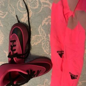 Pink soccer shoes